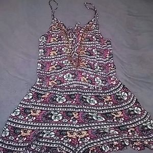 American eagle open back, lace up front romper